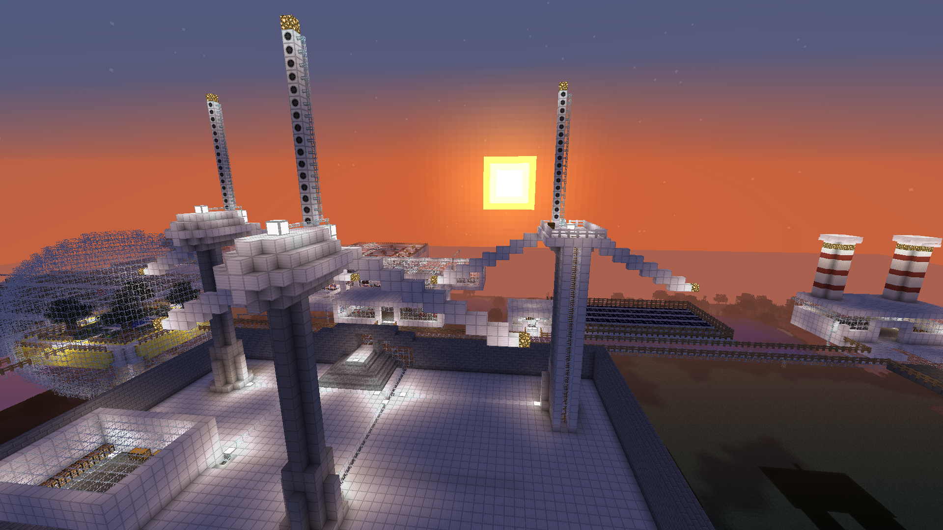 overview of the back of the turbines at sunset