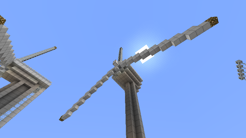 Looking up at a large wind turbine from the base